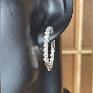 Simulated diamond hoops set in sterling silver. Size Medium.